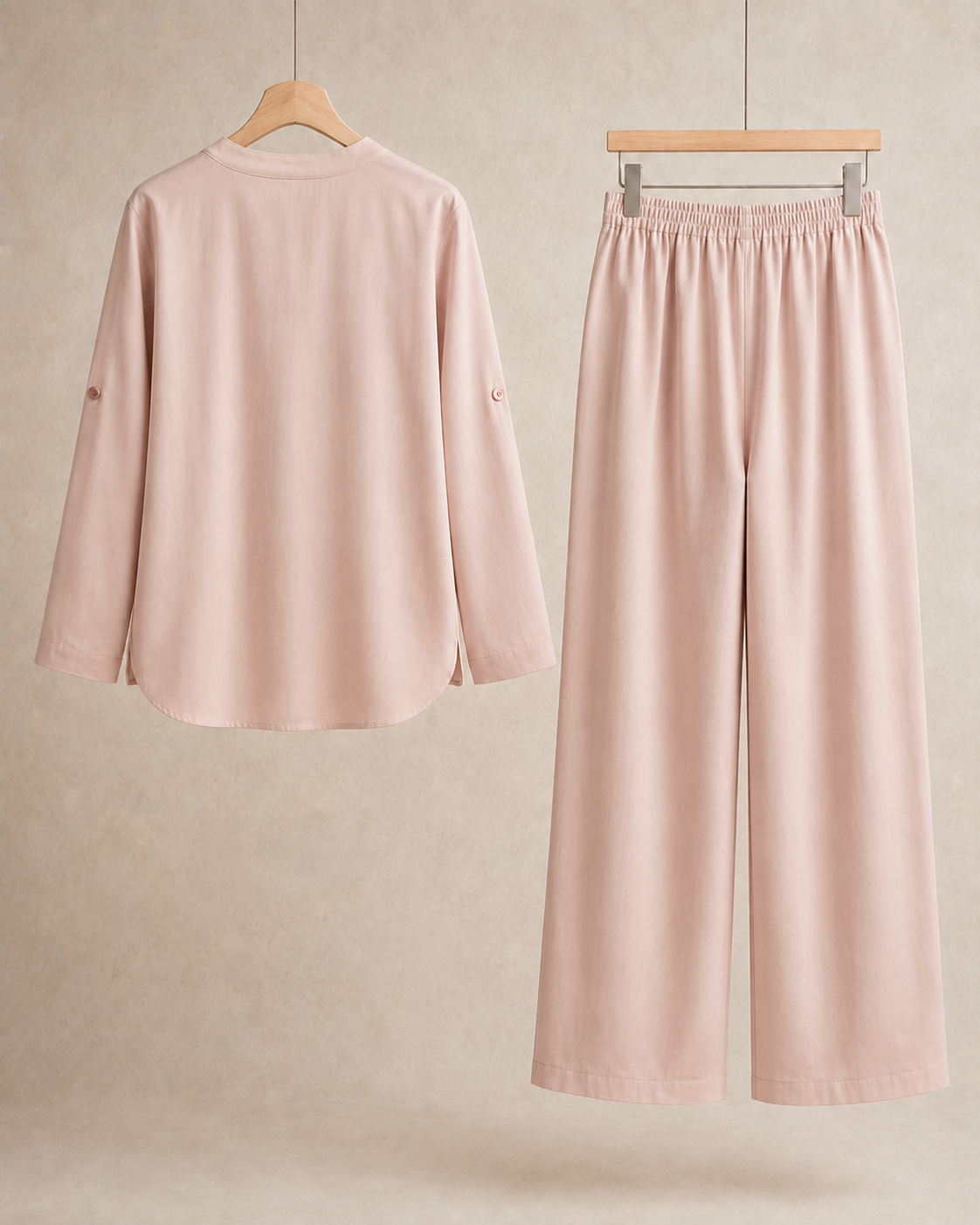 Shelby Twill Light Pink shirt and trousers displayed separately from the back